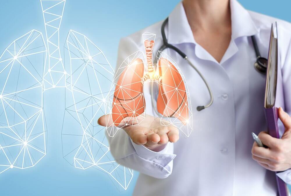Image of a doctor holding a pair of CGI lungs