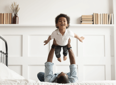 father playing with son