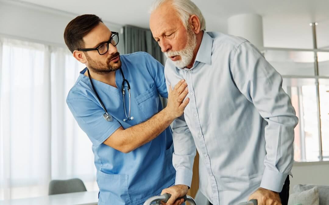 A nurse helping a man with stroke rehabilitation using a walker.